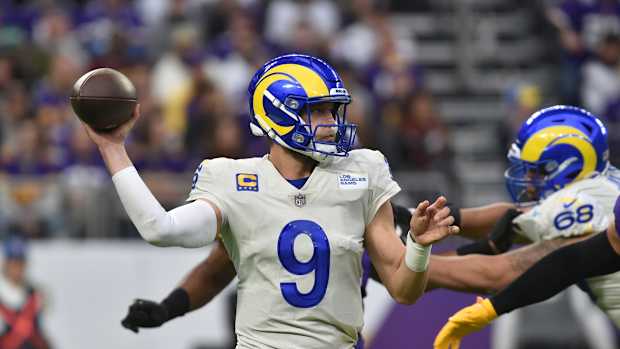 Dec 26, 2021; Minneapolis, Minnesota, USA; Los Angeles Rams quarterback Matthew Stafford (9) throws a pass against the Minnesota Vikings during the second quarter at U.S. Bank Stadium. Mandatory Credit: Jeffrey Becker-USA TODAY Sports